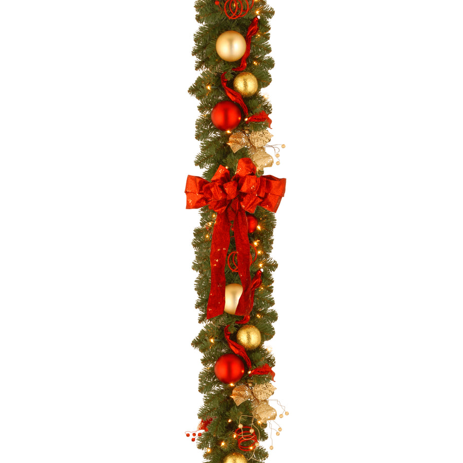 9 ft. Pre-Lit Decorative Collection Cozy Christmas Garland with Red and Clear Lights