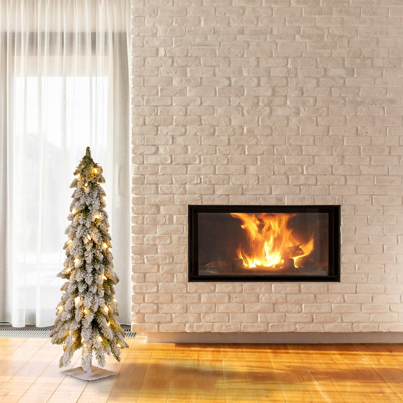 4 ft. Pre-Lit Snowy Downswept Forest Tree with Clear Lights