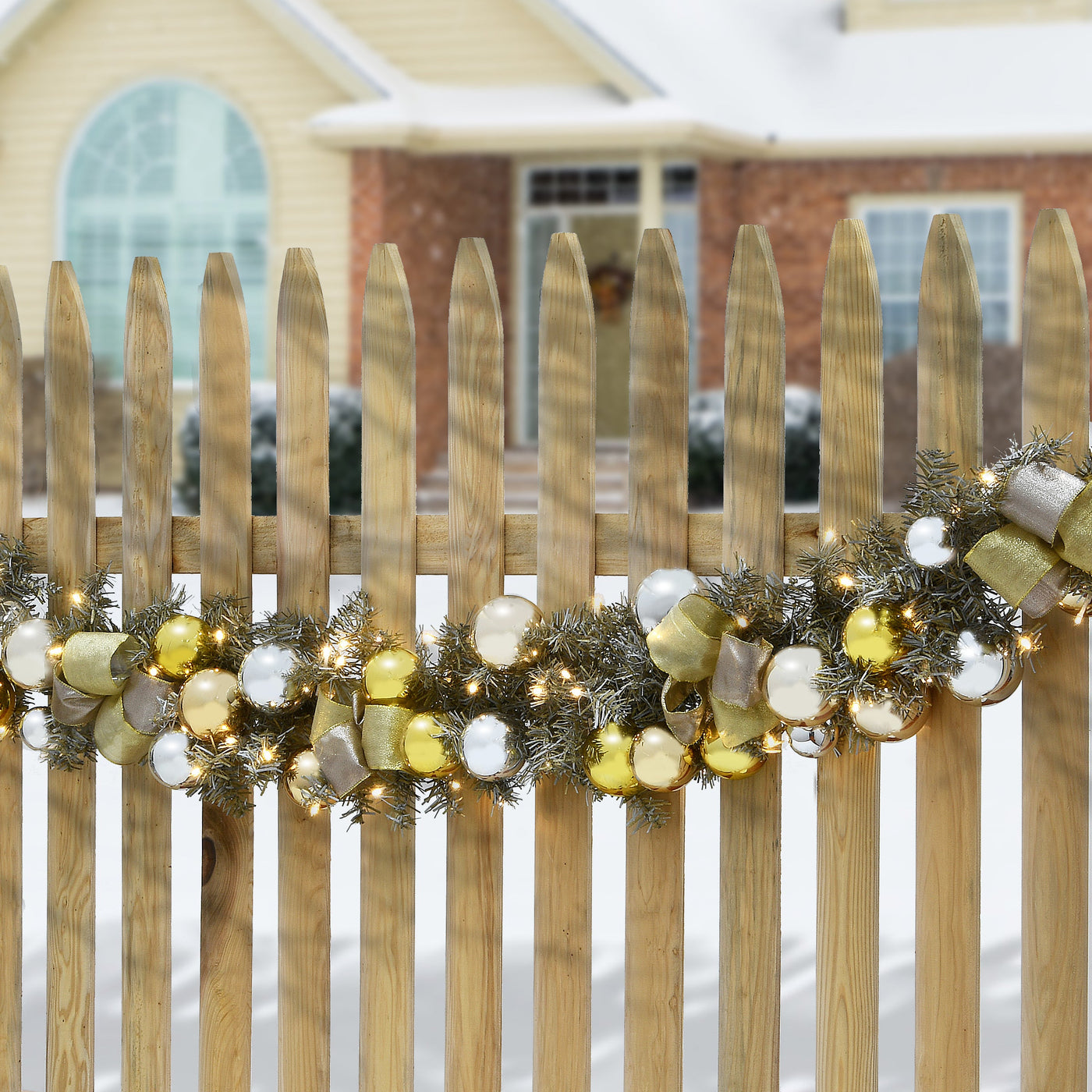 9 ft. Pre-Lit Gold Ornament Metallic Garland with Warm White LED Lights