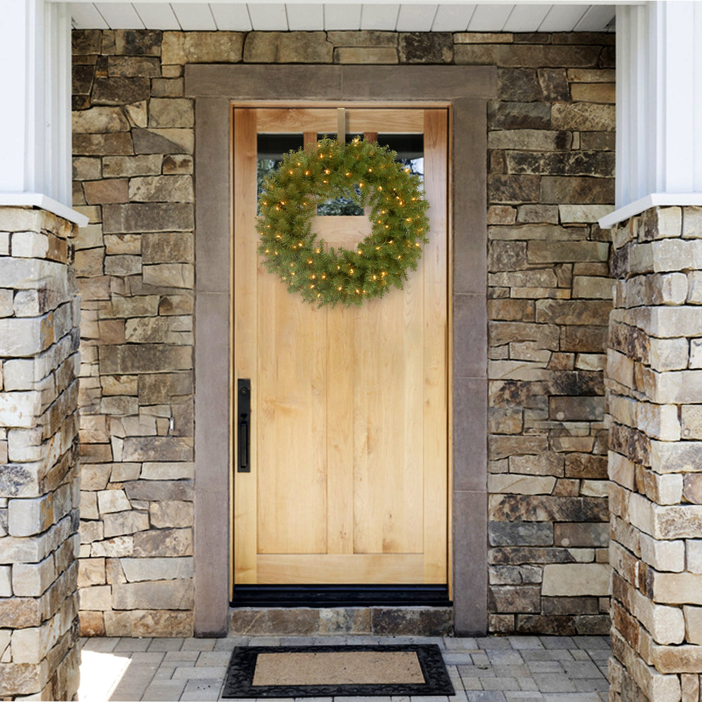 24 in. Pre-Lit North Valley Spruce Wreath with Clear Lights