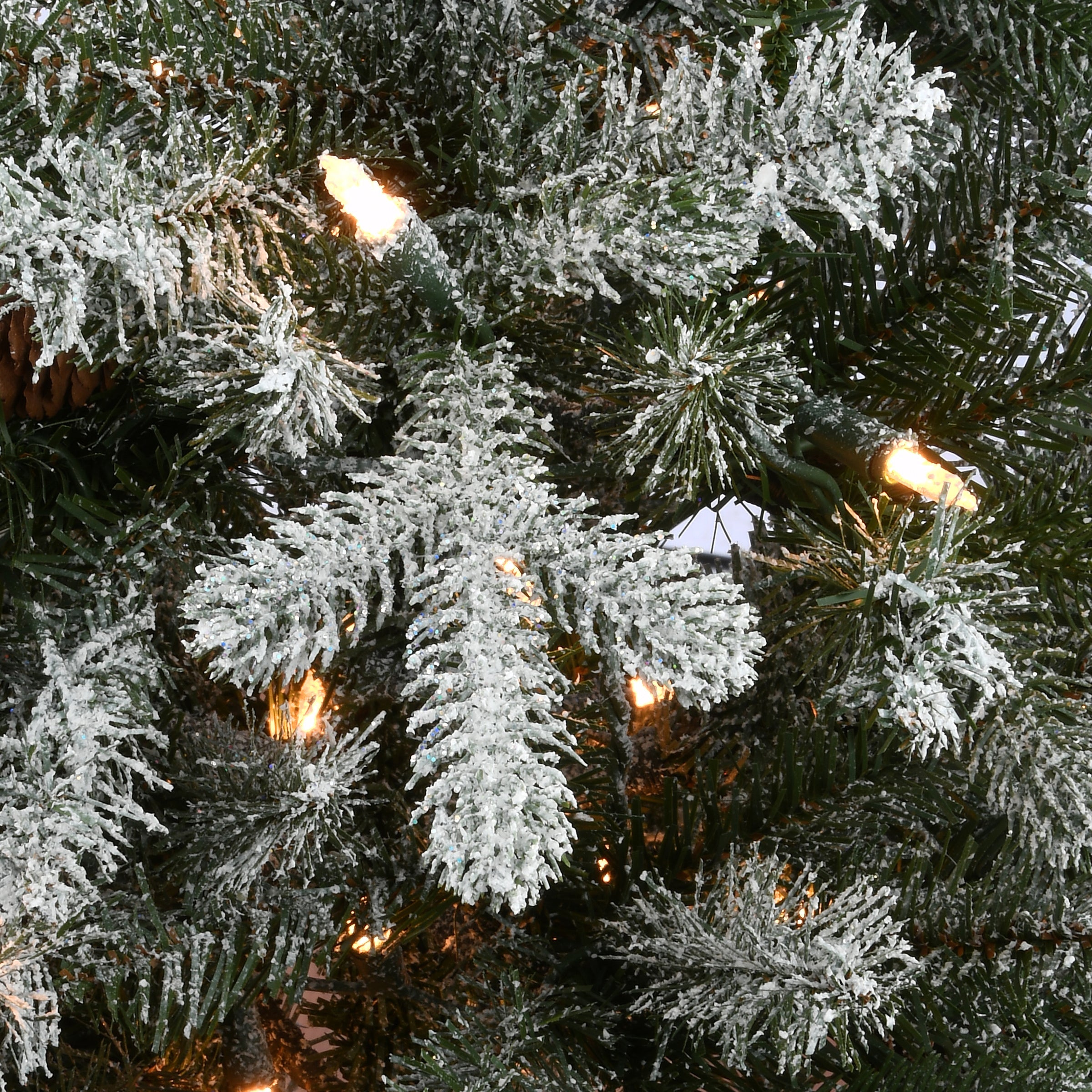 6.5 ft. Pre-Lit Snowy Morgan Spruce Slim Tree with Clear Lights
