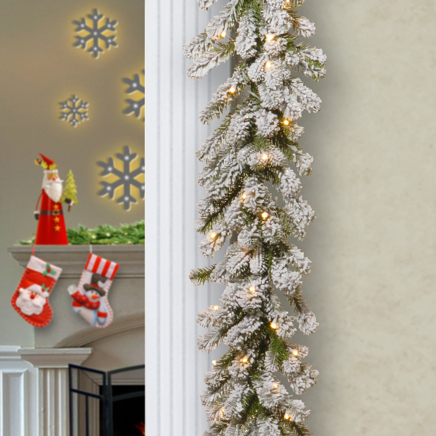 9 ft. Pre-Lit Snowy Sheffield Spruce Garland with Twinkly LED Lights