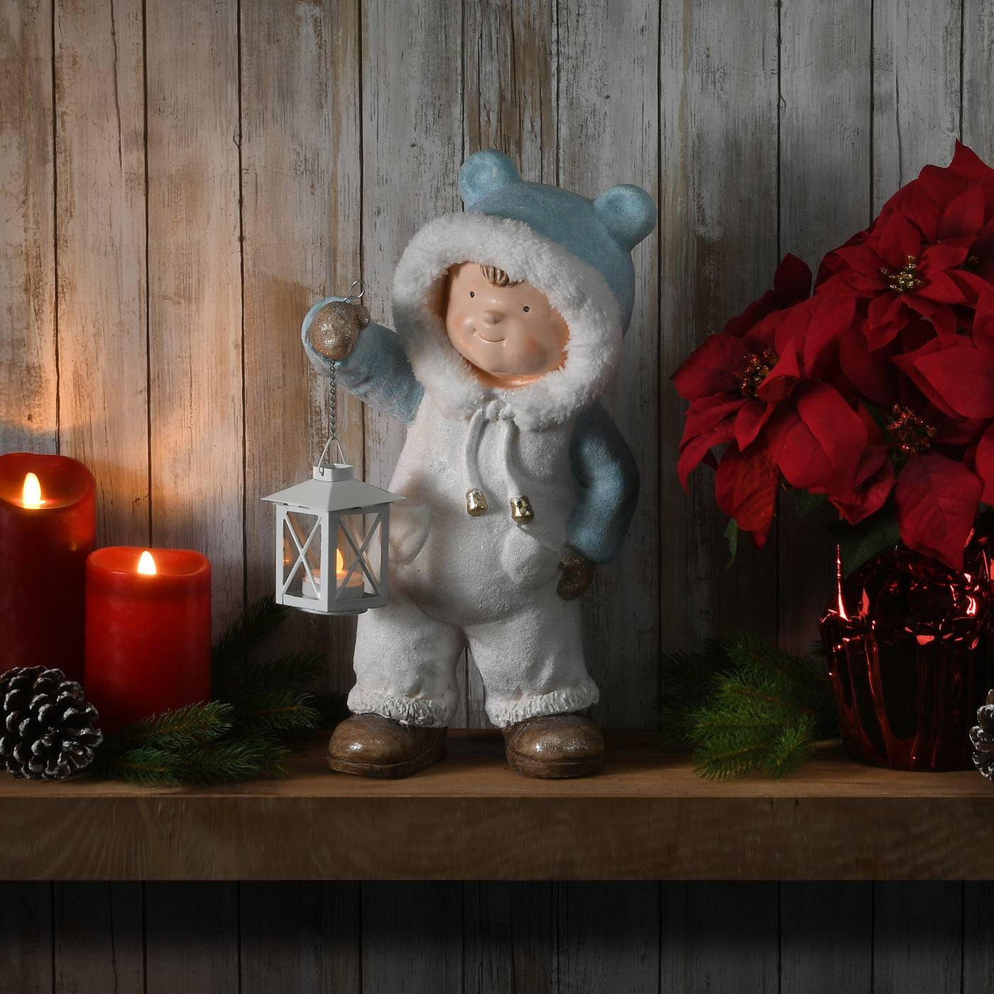 17 in. Boy in Snowsuit Candleholder Figuerine