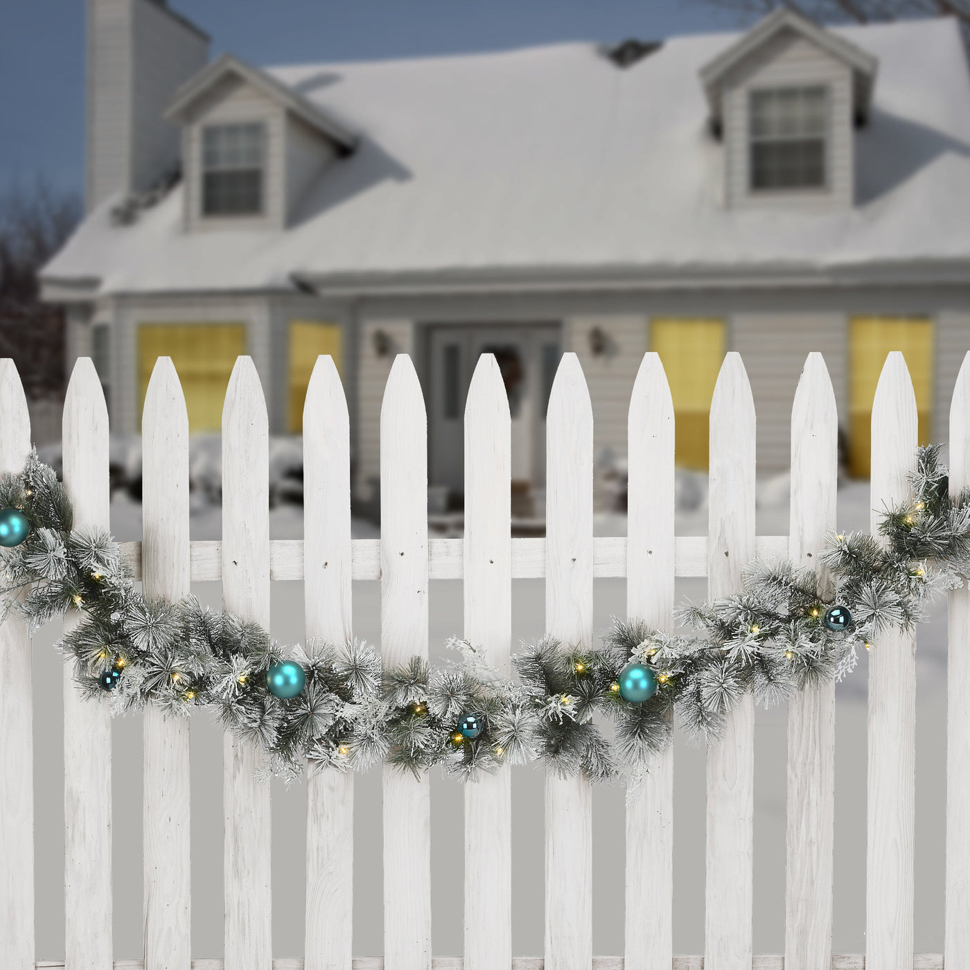 9 ft. Pre-Lit Snowy Tinkham Pine Garland with LED Lights