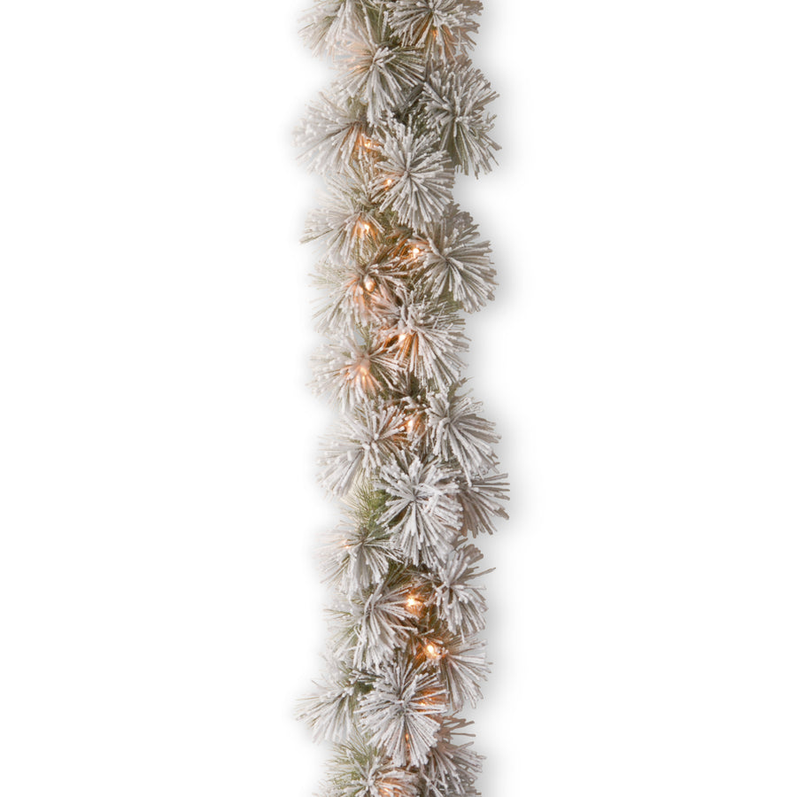 9 ft. Pre-Lit Snowy Bristle Pine Garland with Clear Lights