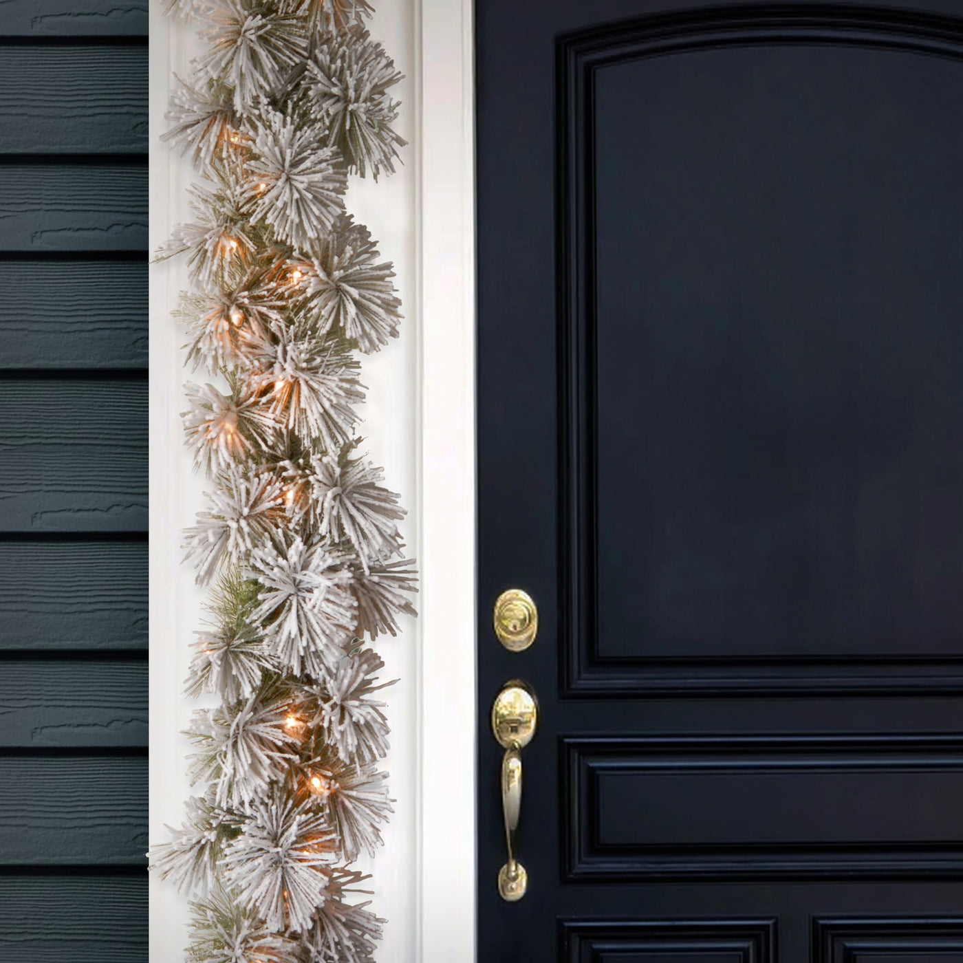 9 ft. Pre-Lit Snowy Bristle Pine Garland with Clear Lights
