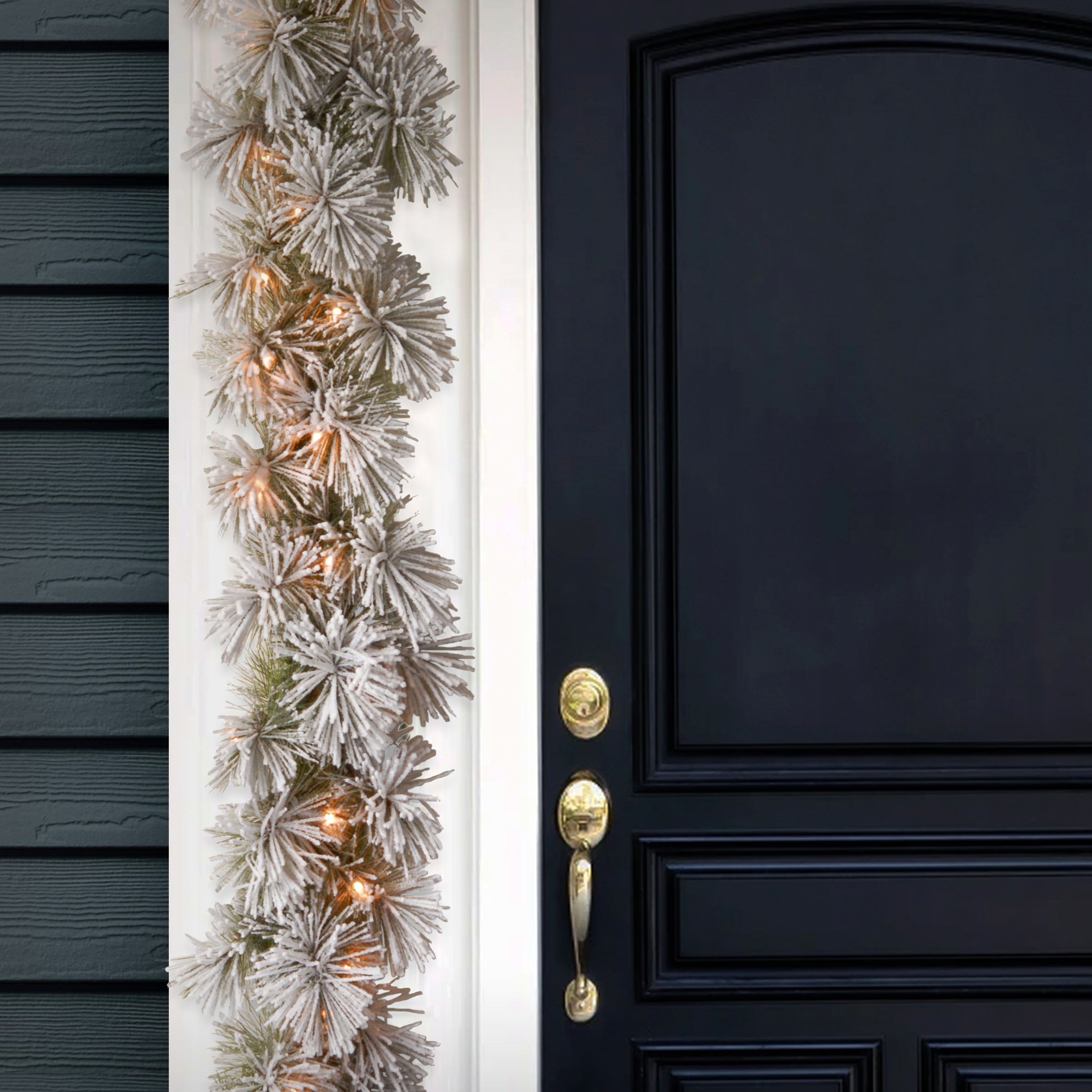 9 ft. Pre-Lit Snowy Bristle Pine Garland with Clear Lights