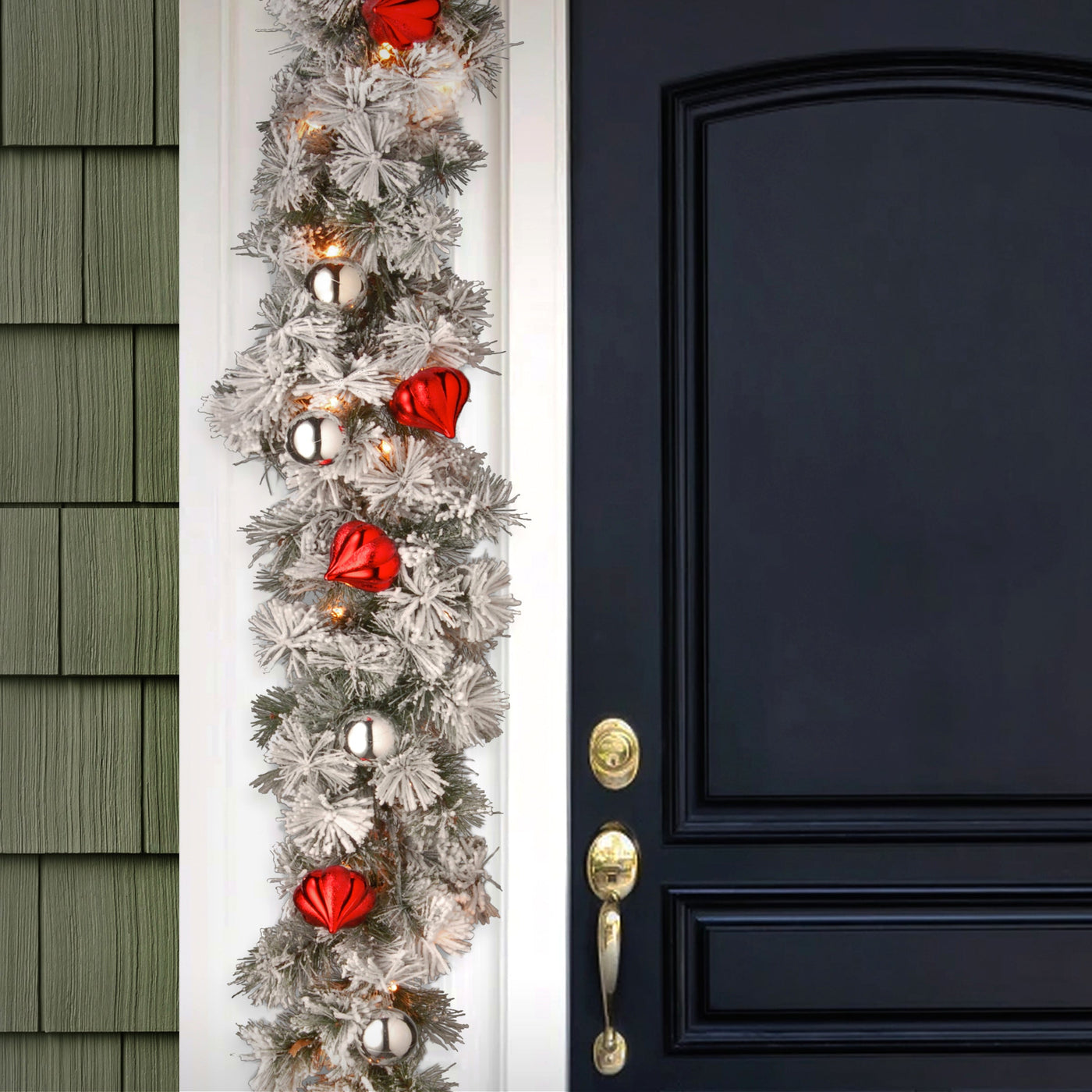 9 ft. Pre-Lit Snowy Bristle Pine Garland with Clear Lights and Ornaments