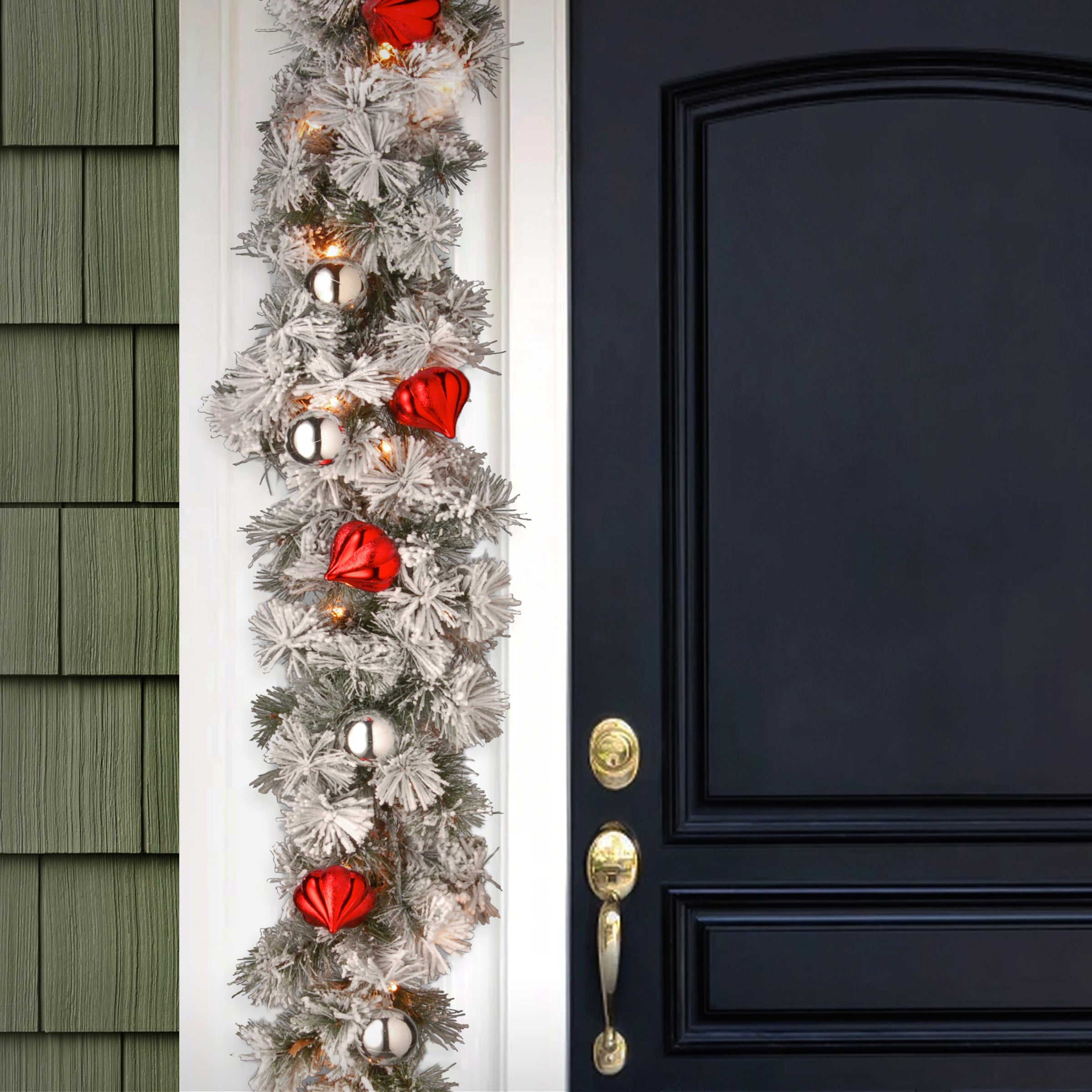 9 ft. Pre-Lit Snowy Bristle Pine Garland with Clear Lights and Ornaments